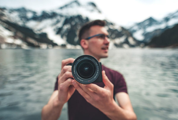 A man holding a camera